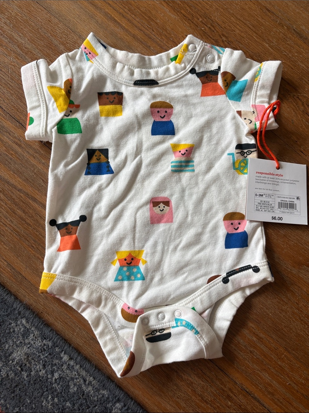 NWT One-Piece Bodysuit with Multicolor Faces